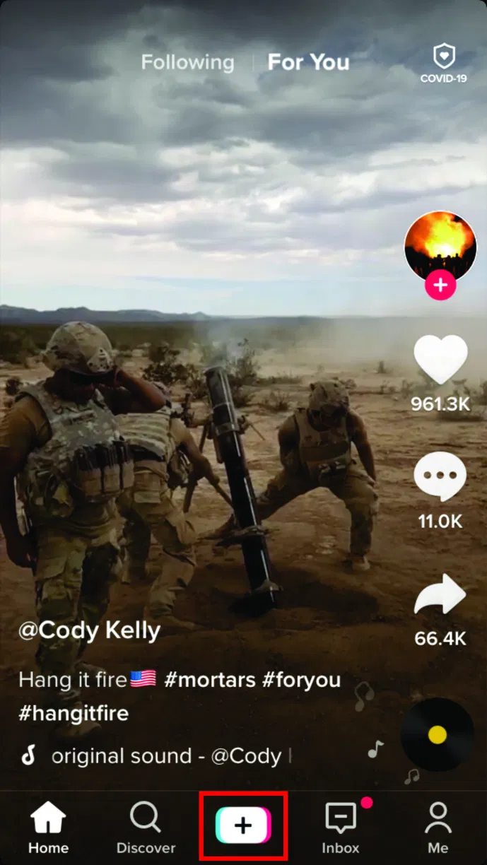 Launch the TikTok app on your smartphone, then tap on the + (plus) sign to make a new video.