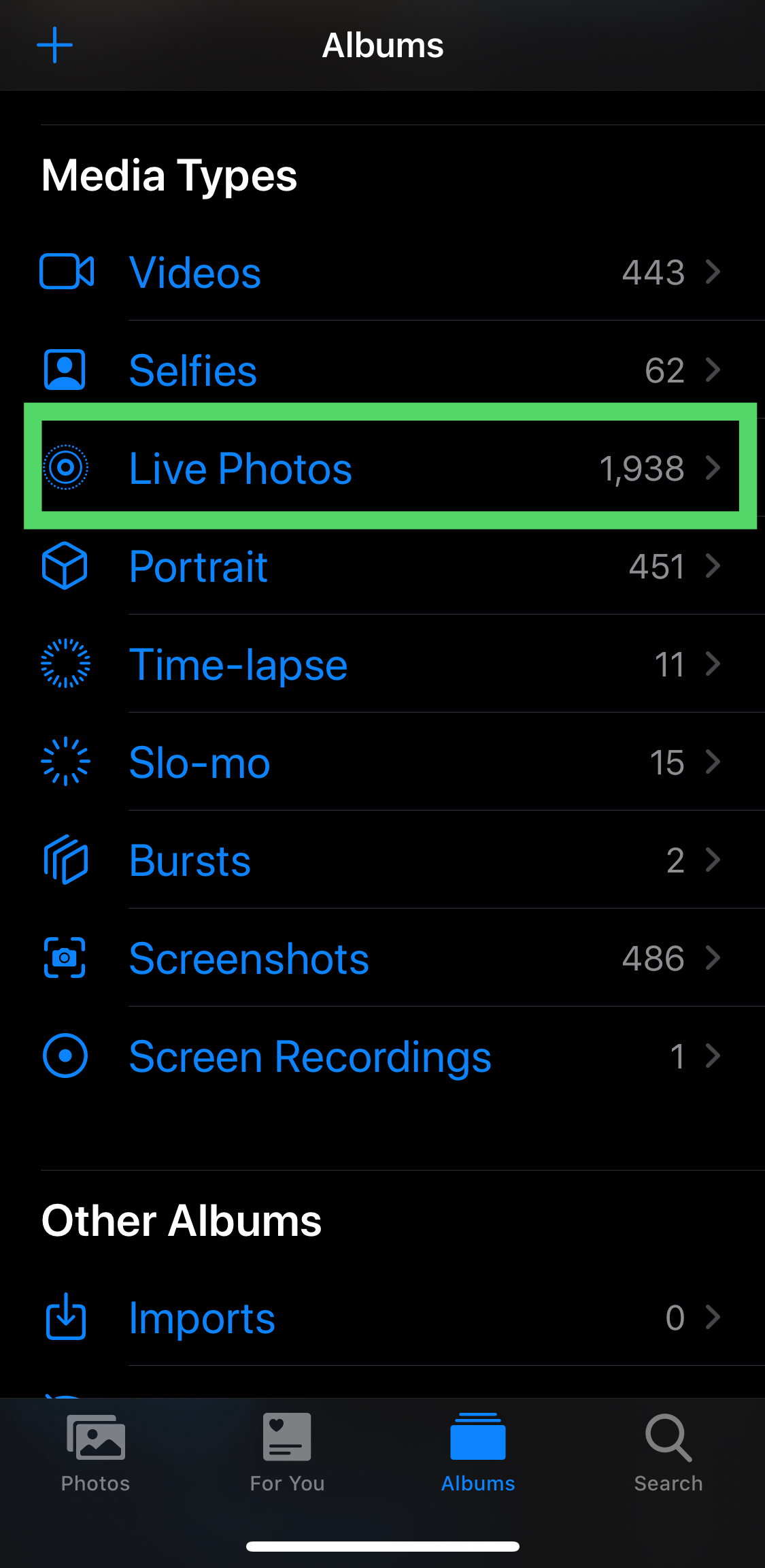 Open the Camera app on your iPhone and tap on Live Photos.