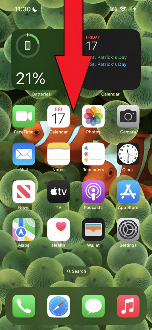 Access the Lock Screen by swiftly swiping down from the notch or Dynamic Island on the home screen