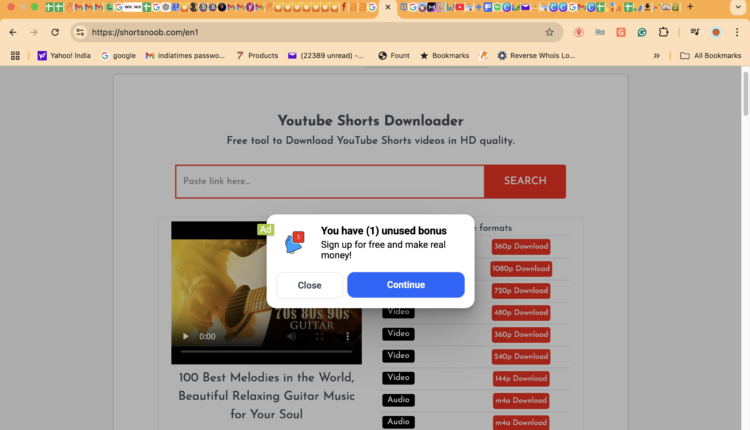 shortsnoob.com youtube video download options with a suspicious advertising popup displayed, offering a "bonus" for signup. Download formats include 144p to 1080p video and M4A audio.
