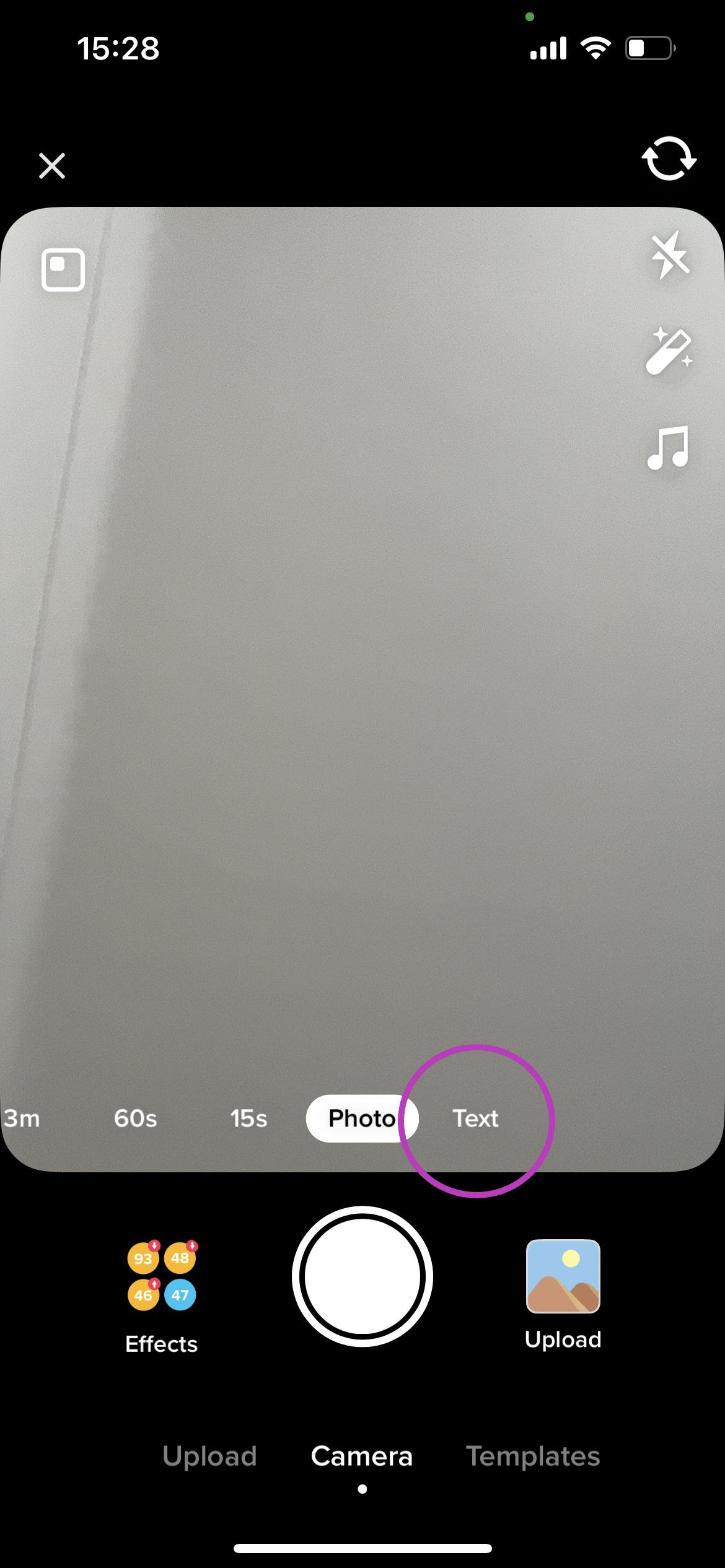 On the camera screen, swipe left to access the Text option