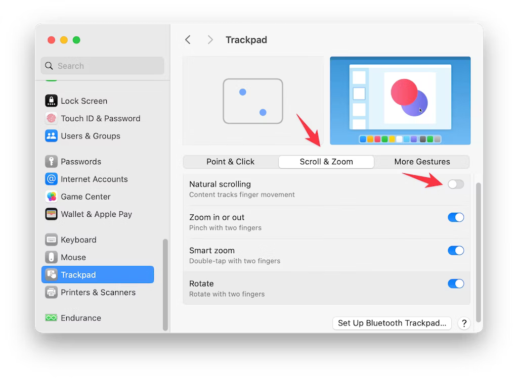 Turn onoff the toggle next to Natural Scrolling to invert the scrolling direction of the Trackpad