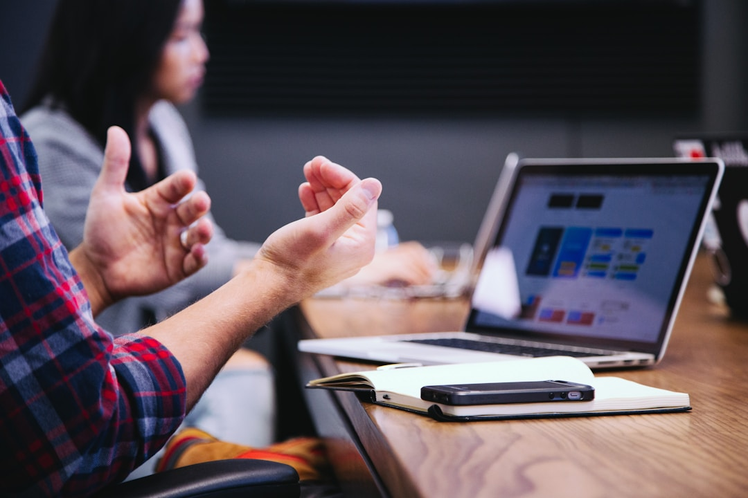 Corporate meeting where professional discusses buying intent