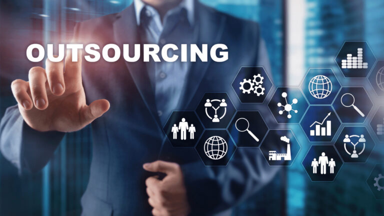 Team outsourcing IT tasks for business growth